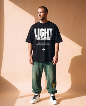 Light Over Darkness tee, black, front print, man, standing full body