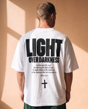 Light Over Darkness tee, white, back print edition, man, back print upper back close up