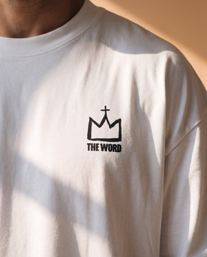 Light Over Darkness tee, white, back print edition, man, front crown chest close up