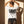 Light Over Darkness tee, white, back print edition, woman, back print hands in hair