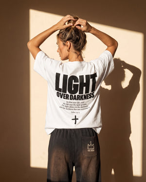 Light Over Darkness tee, white, back print edition, woman, back print hands in hair