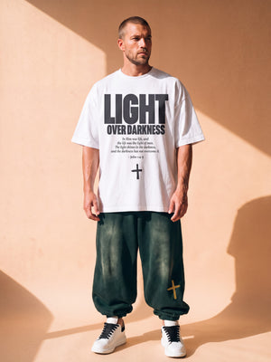 Light Over Darkness tee, white, front print, man, standing full body