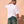Light Over Darkness tee, white, back print, man, back view hand on neck