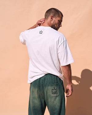Light Over Darkness tee, white, back print, man, back view hand on neck