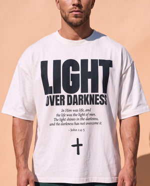 Light Over Darkness tee, white, front print, man, chest close up